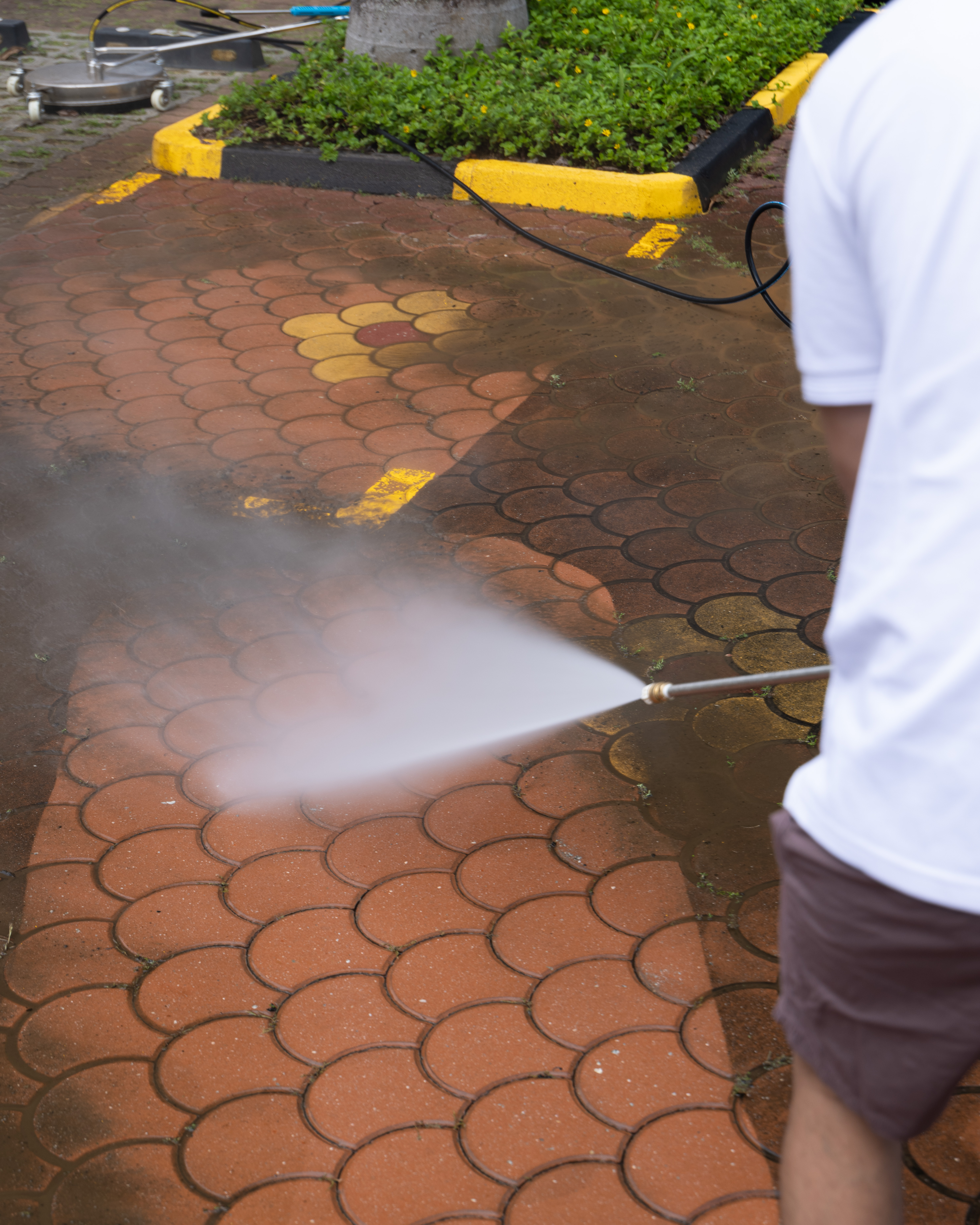 Landed property driveway before and after professional pressure cleaning — Restore. Protect. Enhance.